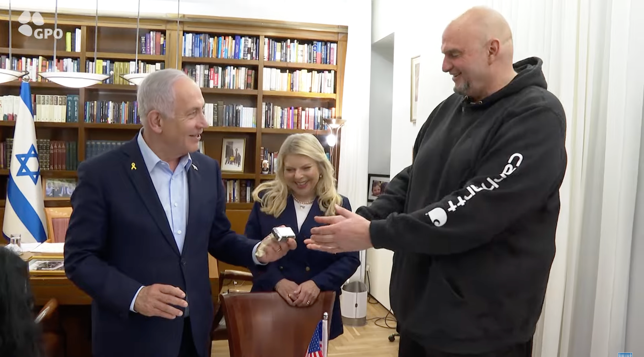 Israeli Prime Minister Benjamin Netanyahu gifts a silver-plated beeper to Sen. John Fetterman on March 19, 2025. (Screenshot)