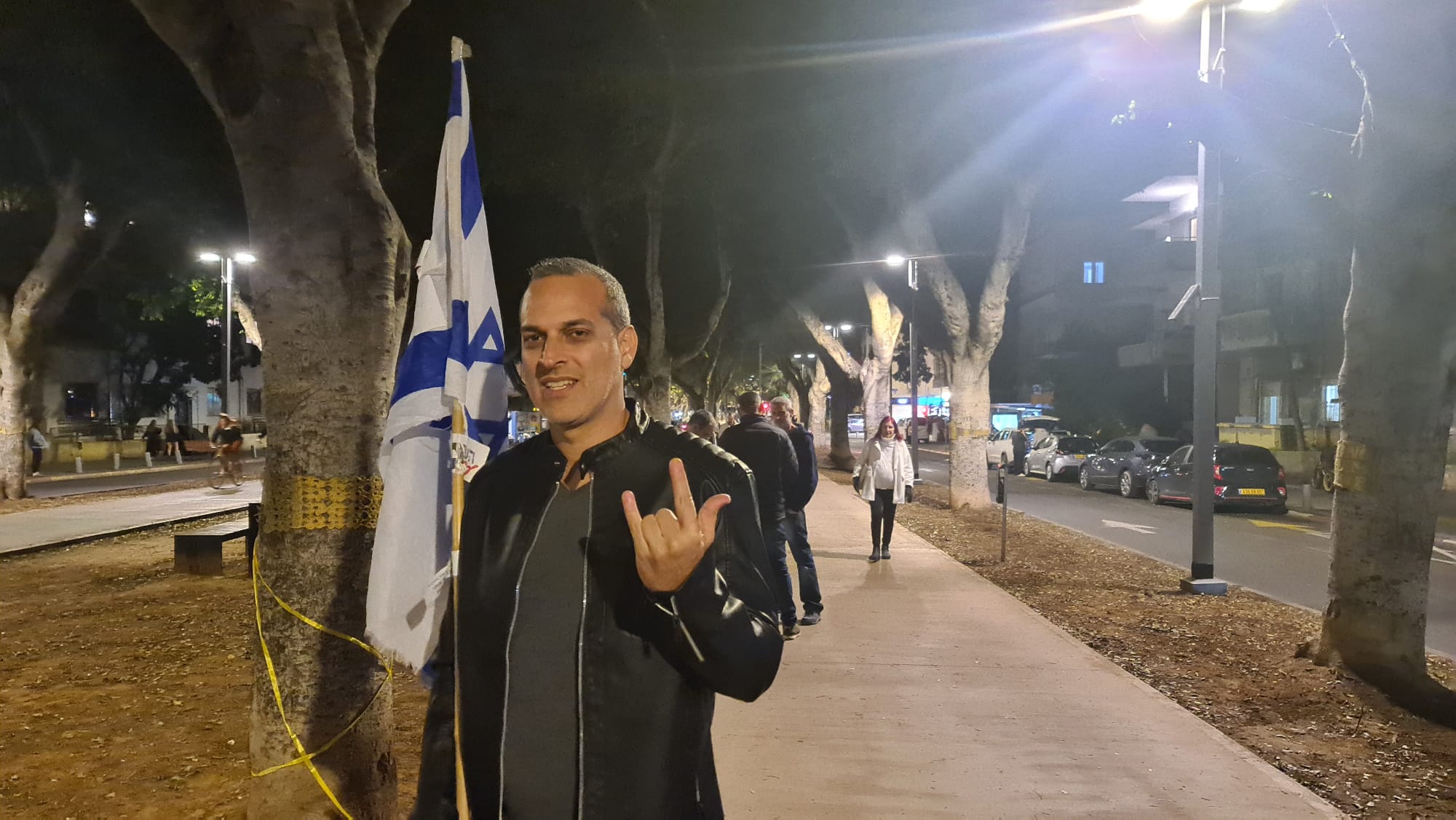 Yoni, who identifies as “more right-wing than Bibi,” joined a mass protest in Tel Aviv against the Israeli prime minister, March 22, 2025. (Deborah Danan)