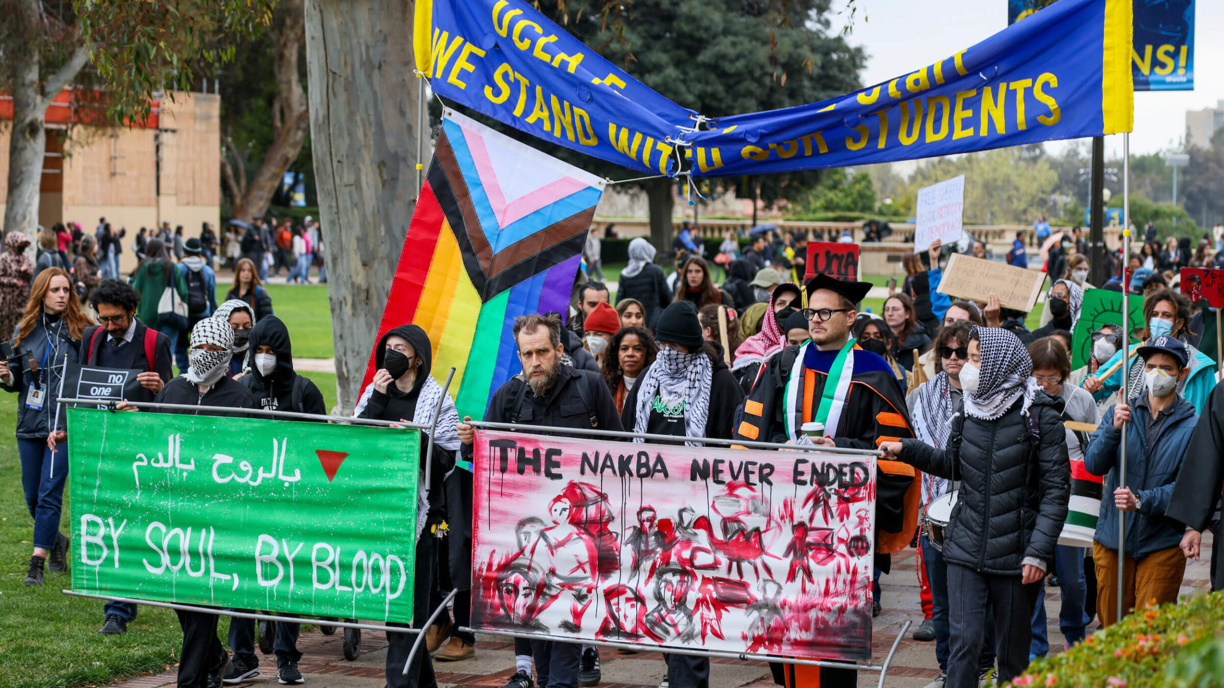 Pro-Palestinian demonstrators march in Royce Quad at UCLA on March 11 in protest of ICE's detainment of Mahmoud Khalil, a Palestinian activist who led protests at Columbia University last year. 