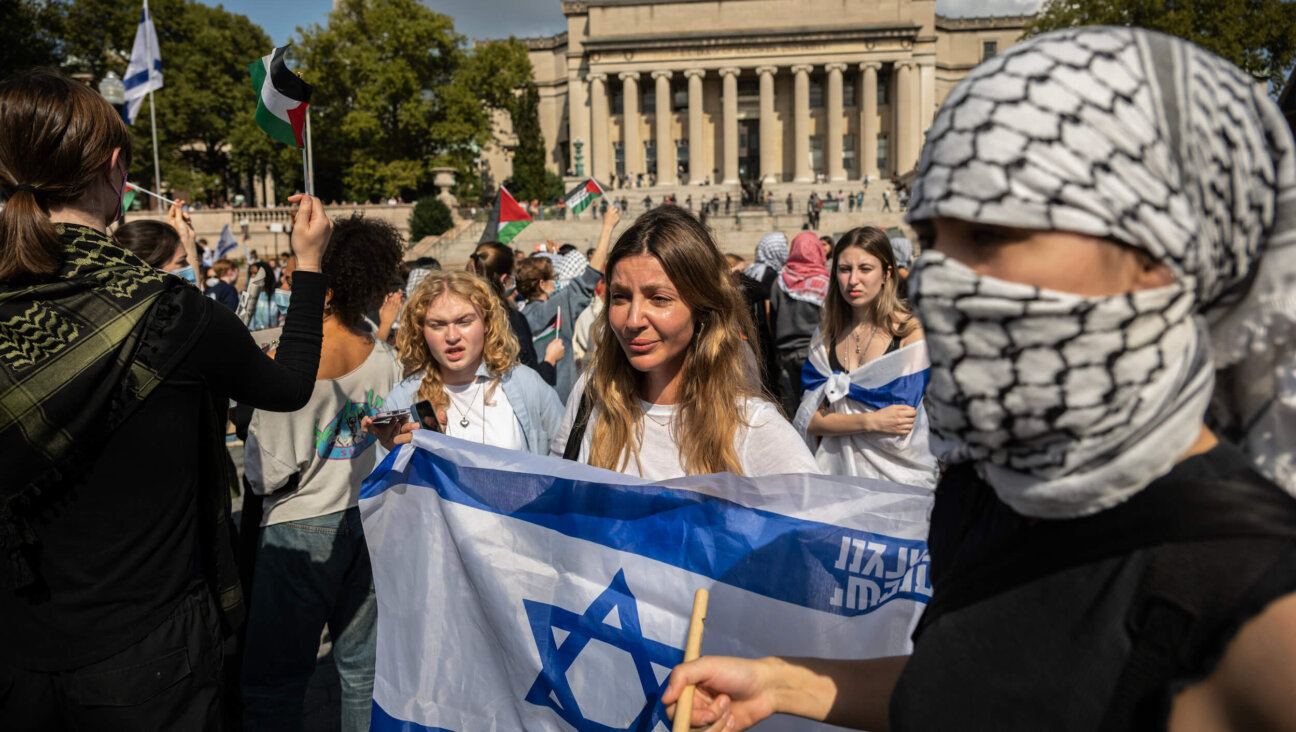 Different groups of students protest against the war in Gaza and in support of Israel at Columbia University on Oct. 7, 2024. 