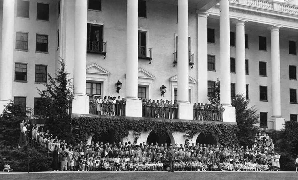 Diplomats and their families pose in front of the Greenbrier in May 1942.