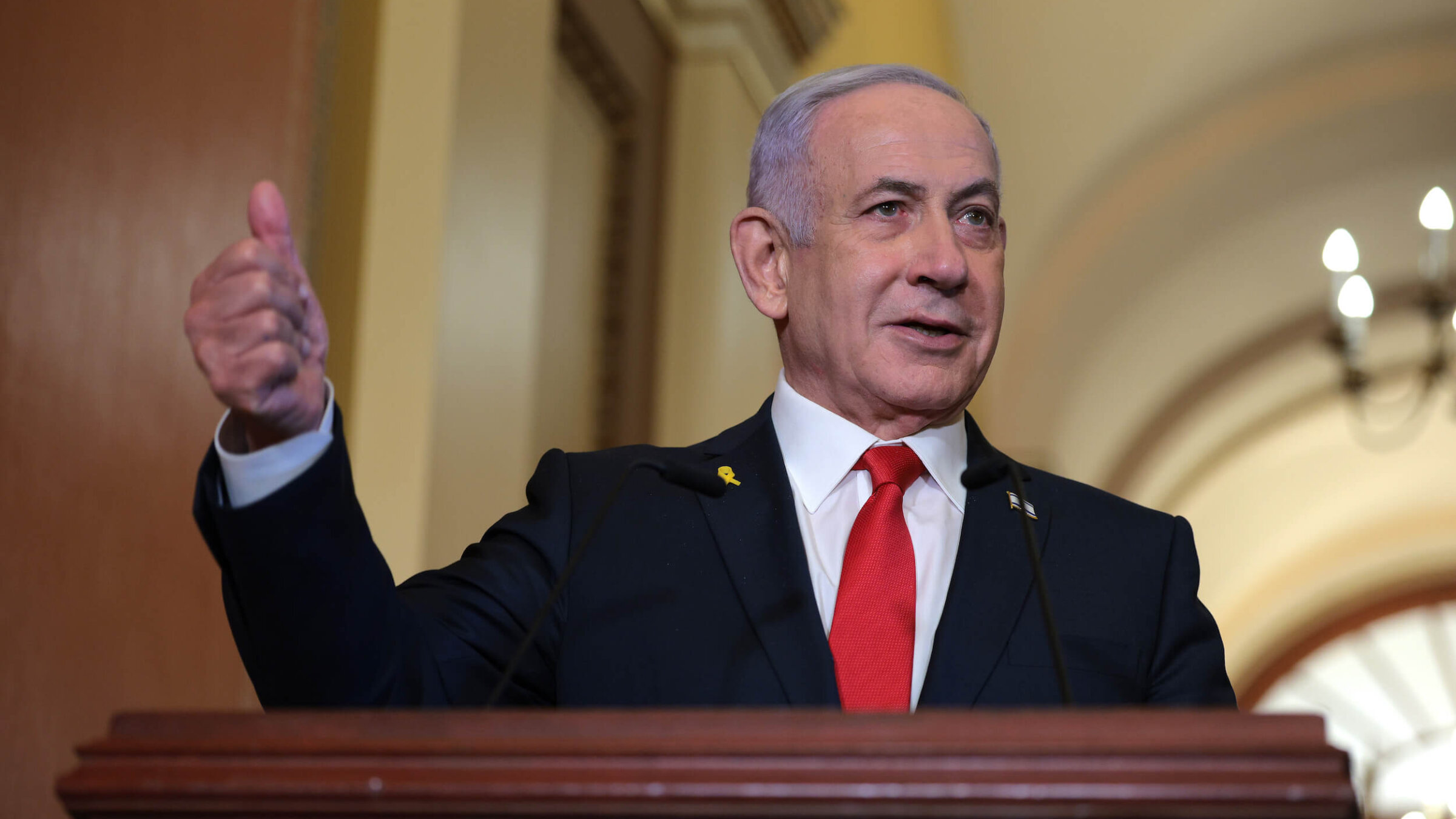 Israeli Prime Minister Benjamin Netanyahu delivers remarks following a meeting with U.S. Speaker of the House Mike Johnson at the U.S. Capitol on Feb. 7. 