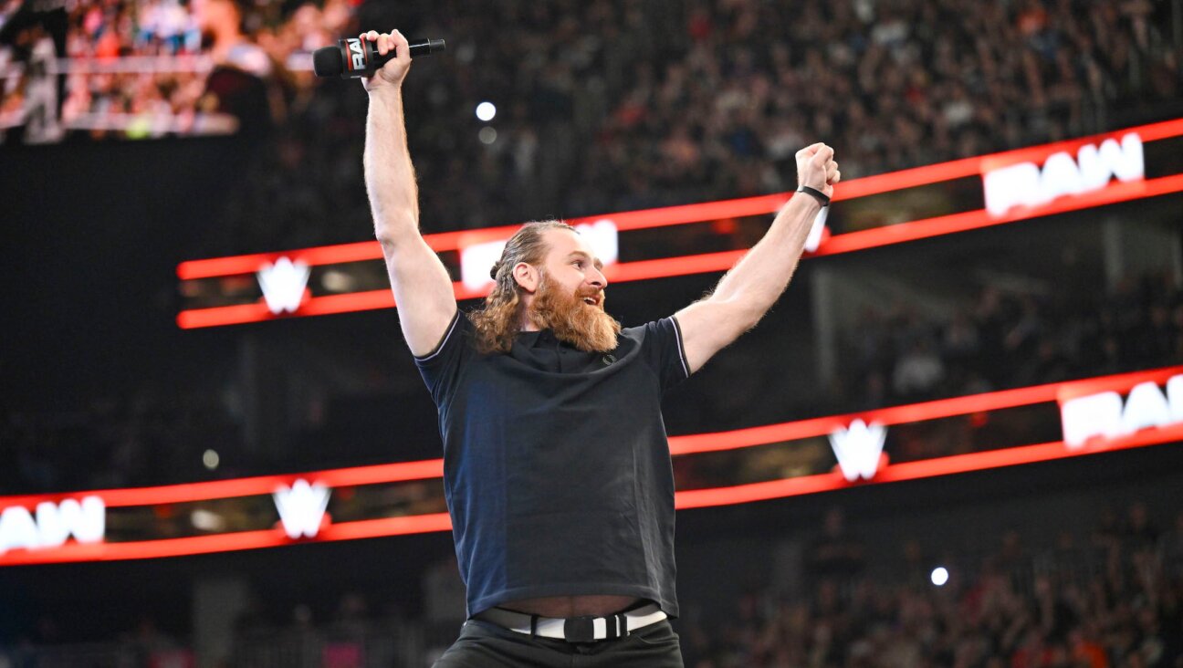Professional WWE wrestler Sami Zayn hypes up the crowd during “Monday Night Raw” at T-Mobile Arena on April 21, 2025 in Las Vegas, Nevada. (Mike Marques/WWE via Getty Images)