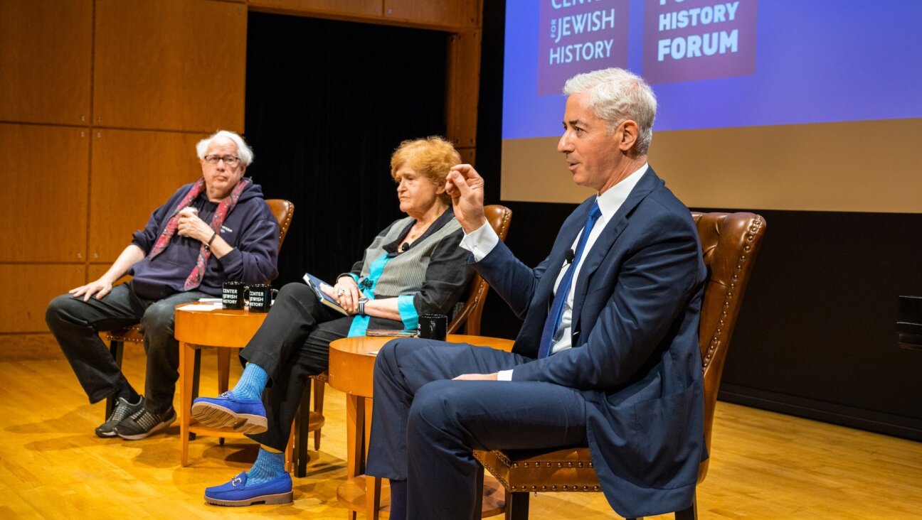 Hedge fund manager Bill Ackman, right, speaks on a panel with Liberties editor Leon Wieseltier and Emory University professor Deborah Lipstadt at “The End of an Era: Jews and Elite Universities,” a symposium at the Center for Jewish History in Manhattan, May 18, 2025. (John Halpern)