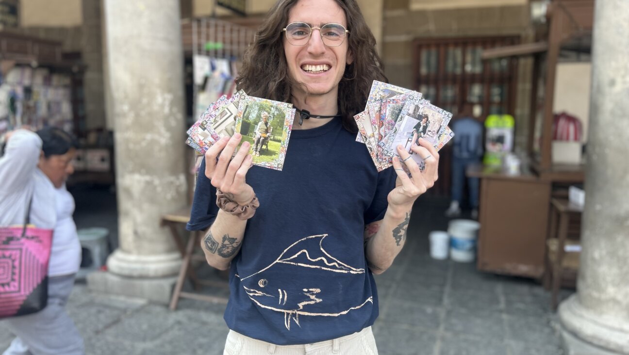 David Calderon Zonana with an array of their "Pocket Abuelitas" zines.
