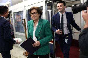Sen. Jacky Rosen walks off the Senate subway at the U.S. Capitol on May 2, 2023.
