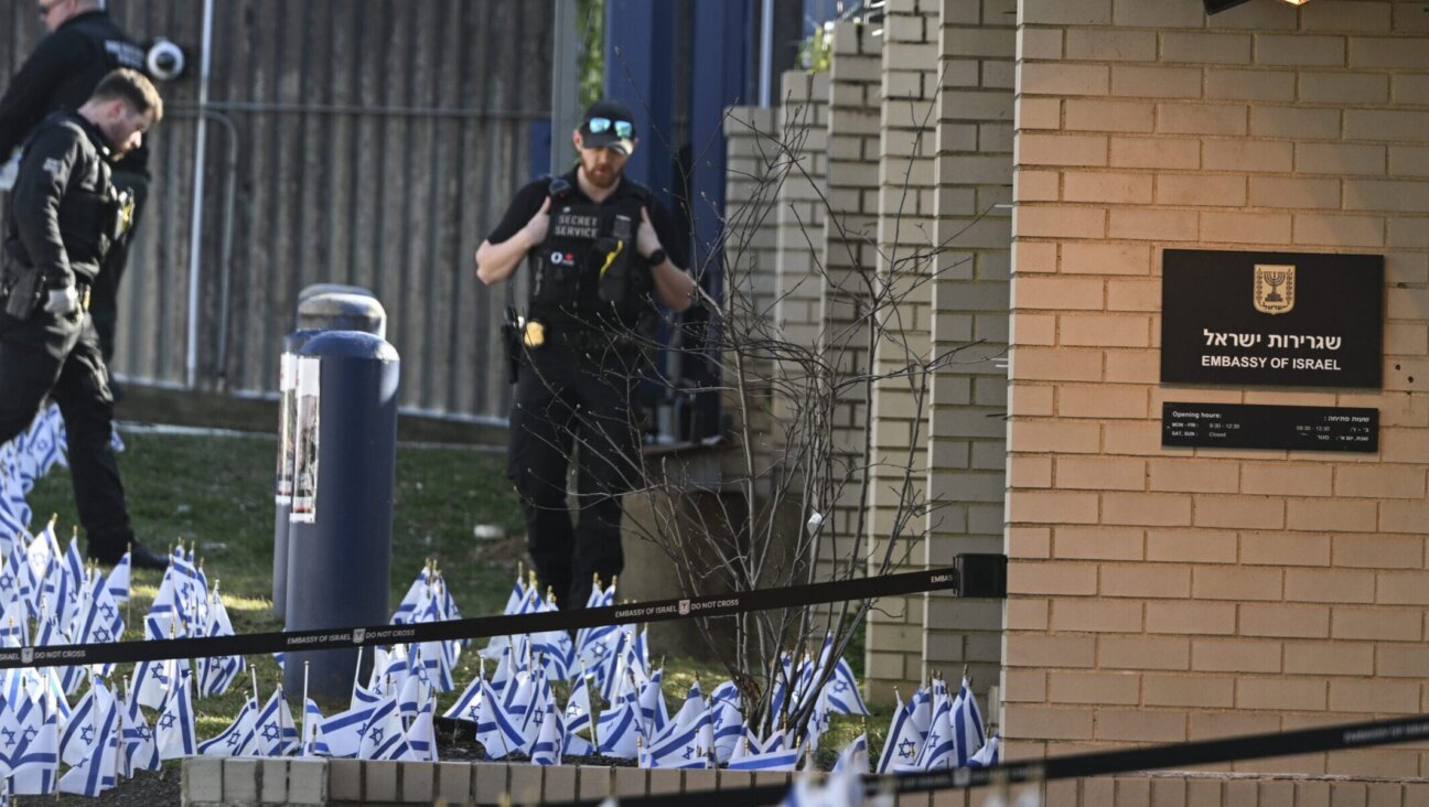 Police take security measures and investigate the crime scene after a member of the US Air Force set himself on fire outside the Israeli Embassy in Washington, D.C., to protest the war in Gaza on Feb. 25, 2024. (Celal Gunes/Anadolu via Getty Images)