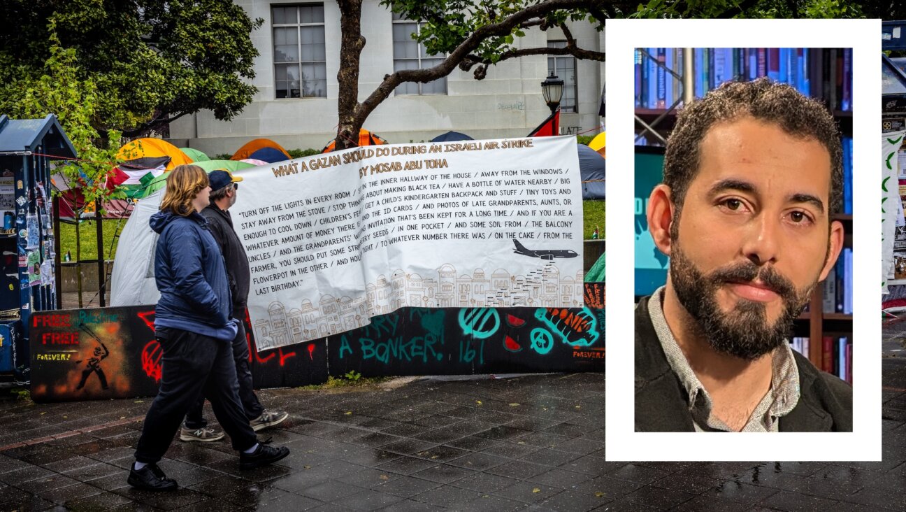 A sign with the poem “What A Gazan Should Do During An Israeli Air Strike,” by Mosab Abu Toha (inset) is seen at the University of California, Berkeley, pro-Palestinian student encampment, May 4, 2024. (Jay L. Clendenin/Getty Images)