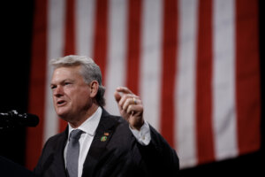 Rep. Mike Collins (R-GA) speaks before Republican presidential nominee, former U.S. President Donald Trump during a campaign rally at the Cobb Energy Performing Arts Centre in Atlanta, Georgia in Oct. 2024.