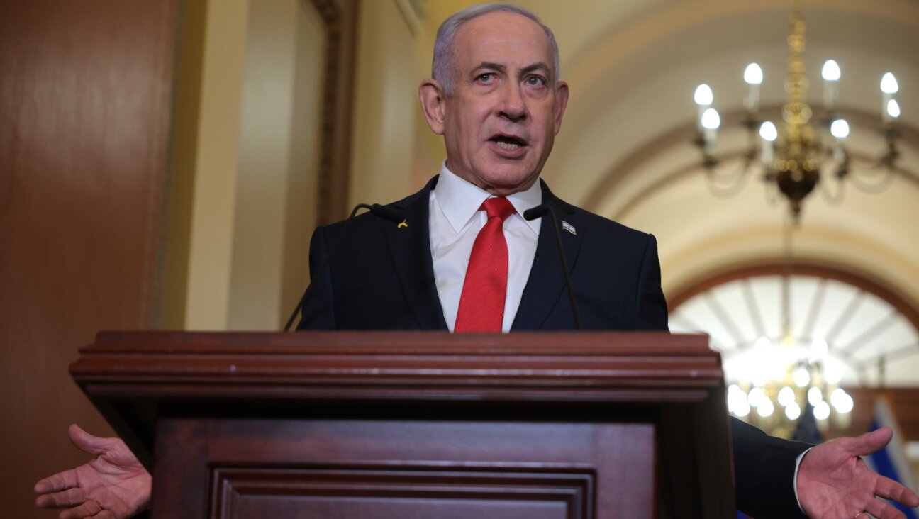 Israeli Prime Minister Benjamin Netanyahu delivers remarks following a meeting with U.S. Speaker of the House Mike Johnson (R-LA) at the U.S. Capitol on February 7, 2025 in Washington, DC. (Kayla Bartkowski/Getty Images)