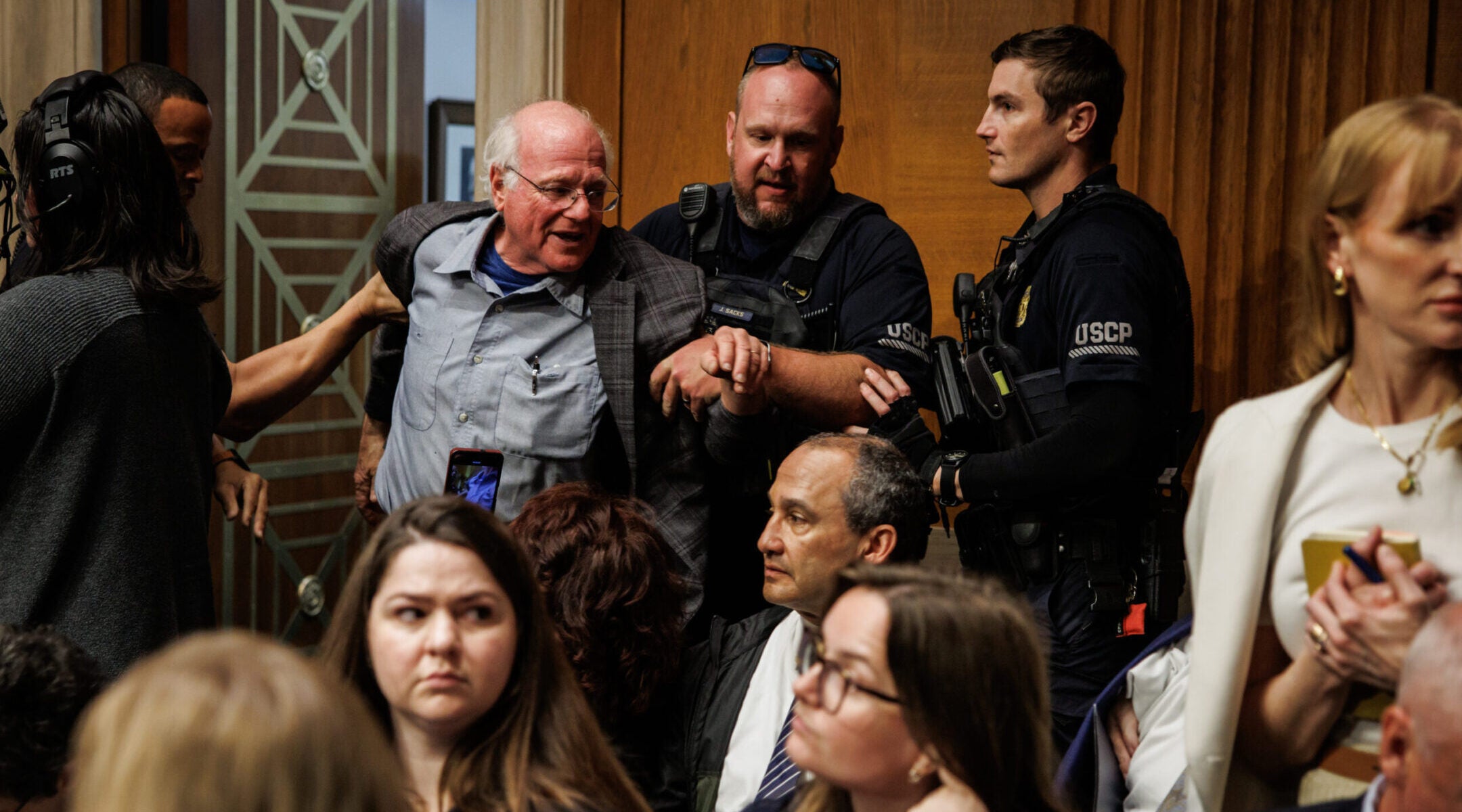 Ben Cohen, co-founder of Ben $ Jerry’s, is detained by U.S. Capitol Police for disrupting proceedings during a hearing with U.S. Secretary of Health and Human Services Robert F. Kennedy Jr., May 14, 2025 in Washington, D.C (Samuel Corum/Getty Images)