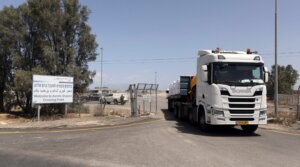 A humanitarian aid truck moves at the Israeli side of the Kerem Shalom Crossing Point on May 19, 2025 in Southern Israel. (Amir Levy/Getty Images)