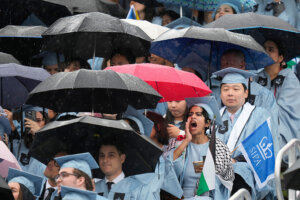 A student boo's as Columbia University's president Claire Shipman speaks during the Commencement Ceremony at Columbia. 