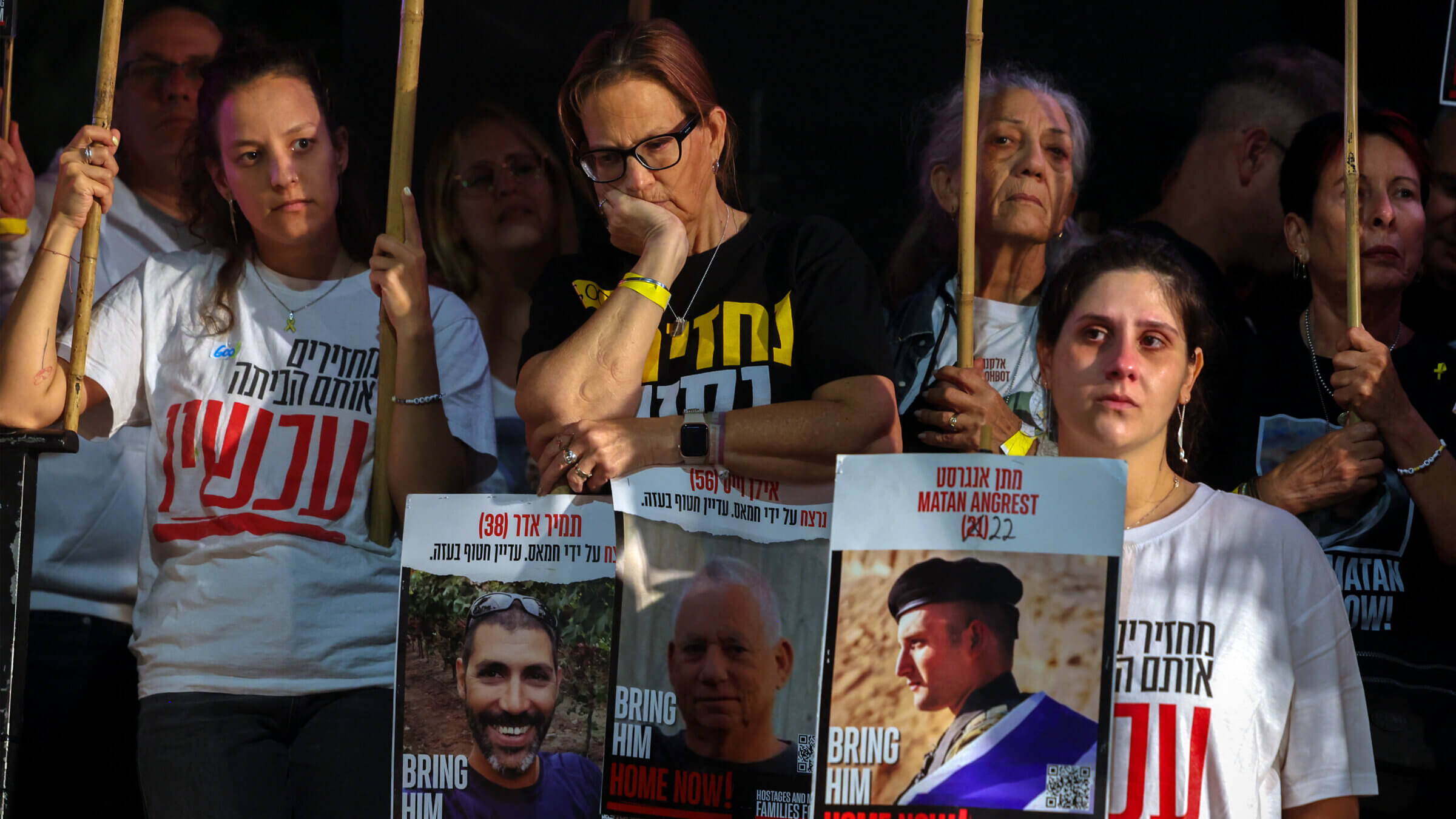Relatives and supporters of Israeli hostages hold their portraits during a protest at Hostages Square in Tel Aviv on May 28, 2025, to mark 600 days of their captivity.