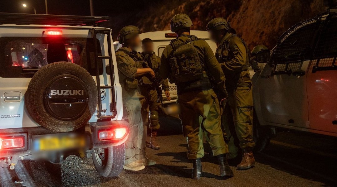 Israeli forces at the site of the May 14, 2025, shooting attack in the northern West Bank. (Israel Defense Forces/X)