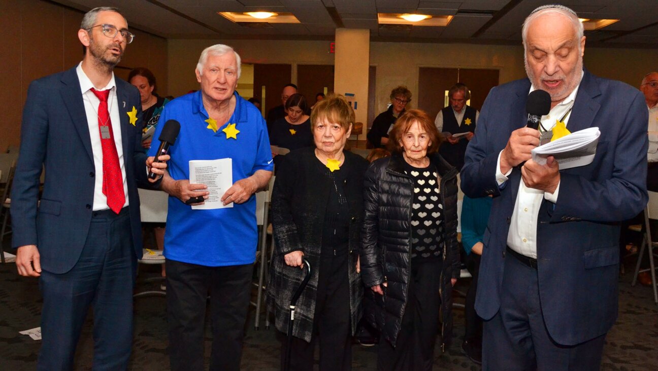 (From left): Hebrew Institute Rabbi Steven Exler; Holocaust survivors Leo Scheiner, his sister Doris Seaman and Evelyne Appel, and HIR founder Rabbi Avi Weiss.

