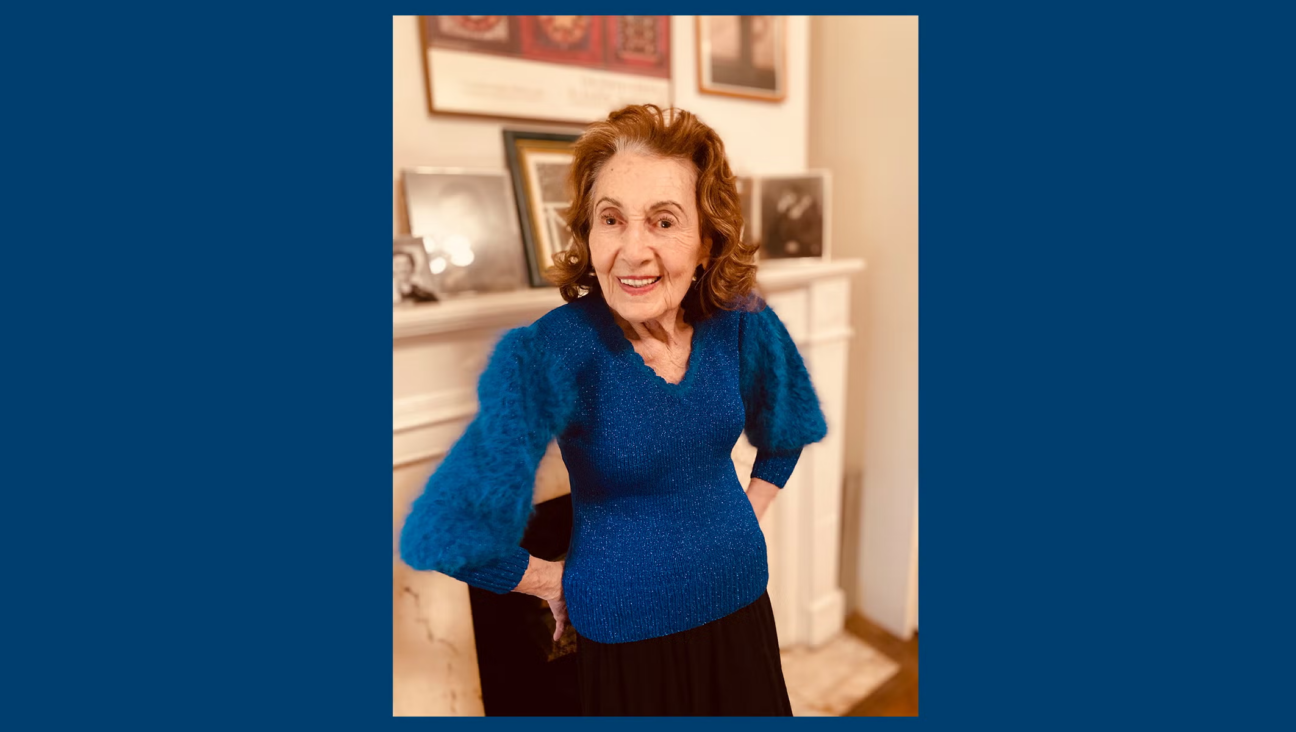 Holocaust survivor Helena Weinstock Weinrauch, who wore the same hand-knit sweater to the first Passover seder every year for the past 75 years, has died at 100. (Karen Goldfarb)