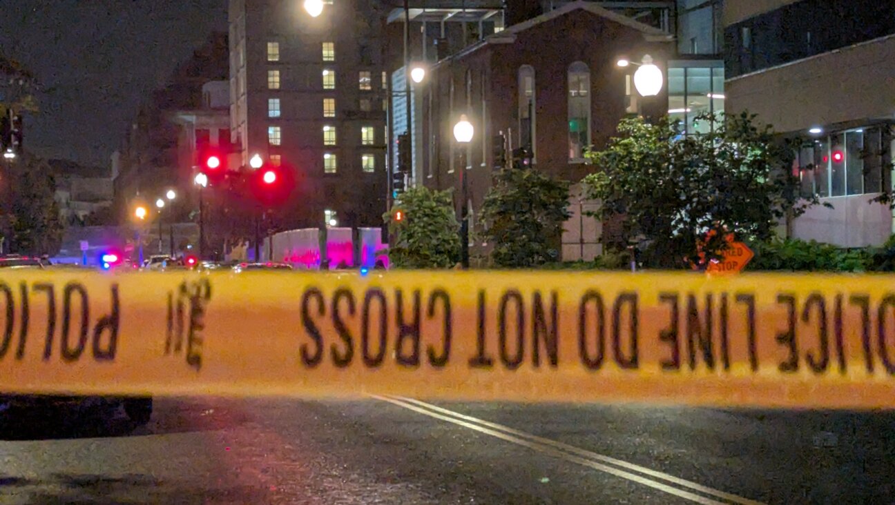 Police cordoned off the blocks surrounding the Capital Jewish Museum after two were killed in a shooting outside an American Jewish Committee event.