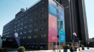 A sign on the Yeshiva University Wilf campus in Washington Heights boasts of the school’s core Torah values. (Spencer Platt/Getty Images)