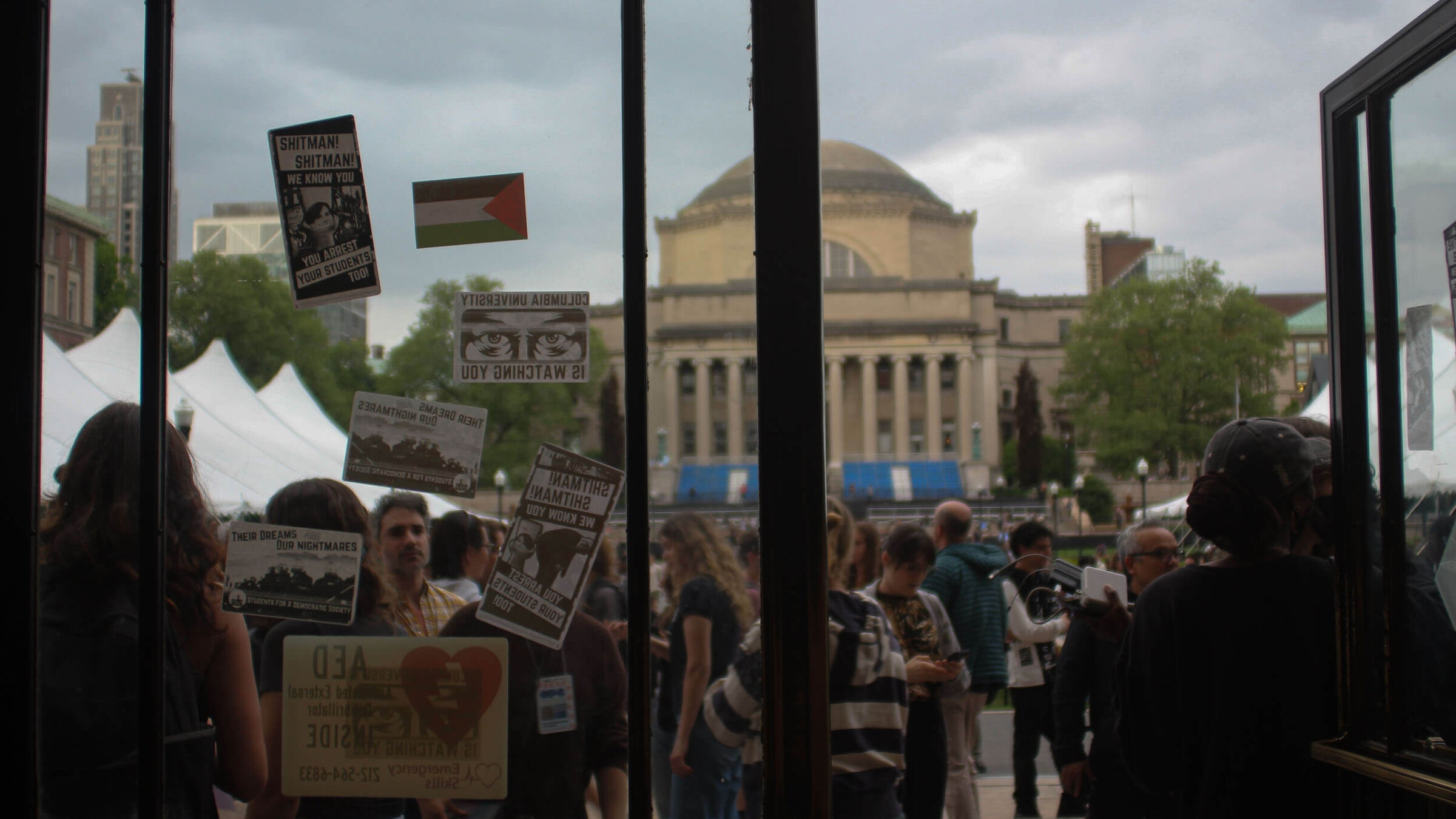 Stickers applied by protesters to the doors of Butler Library at Columbia University on May 7.