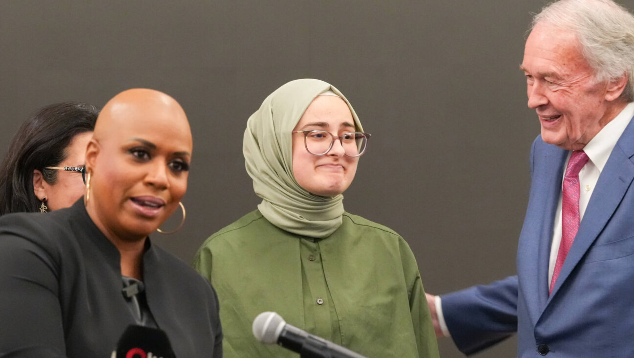 Rümeysa Öztürk appears with Sen. Ed Markey and Rep. Ayanna Pressley after arriving in Boston, after her release from detention on May 10.