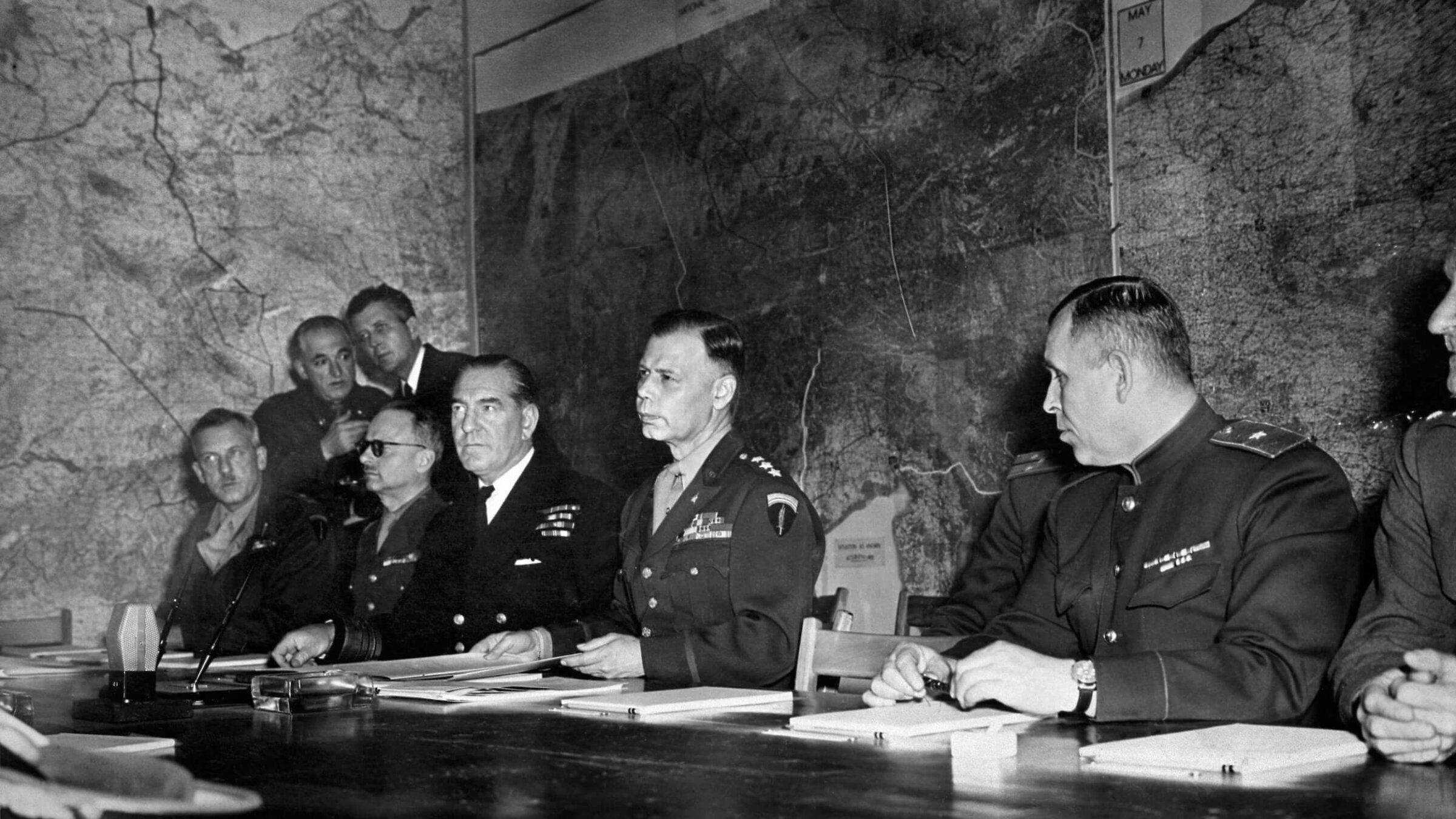 Allied military officials attend the signing of the act of unconditional surrender of Nazi Germany that ended World War II in Europe, at the Allied headquarters in Reims, eastern France, on May 7, 1945.