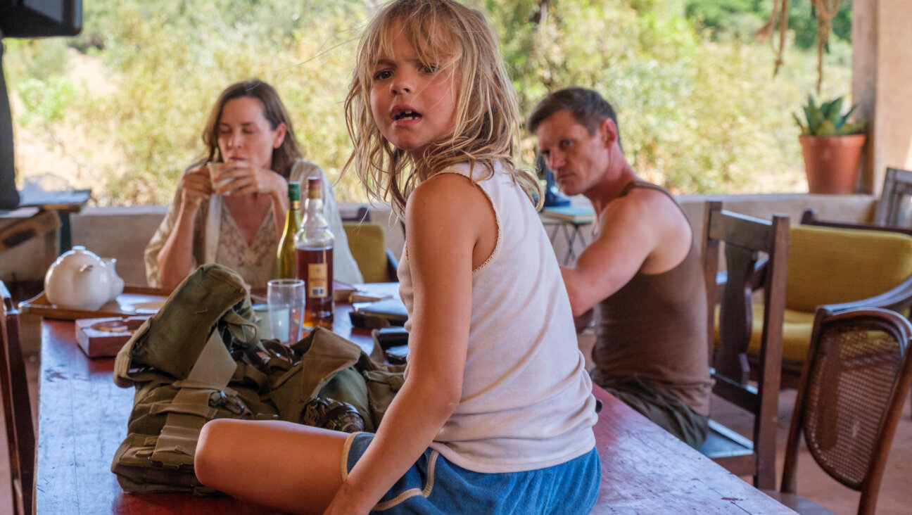 Embeth Davidtz, Lexi Venter and Rob Van Vuuren in <i>Don't Let's Go to the Dogs Tonight.</i>
