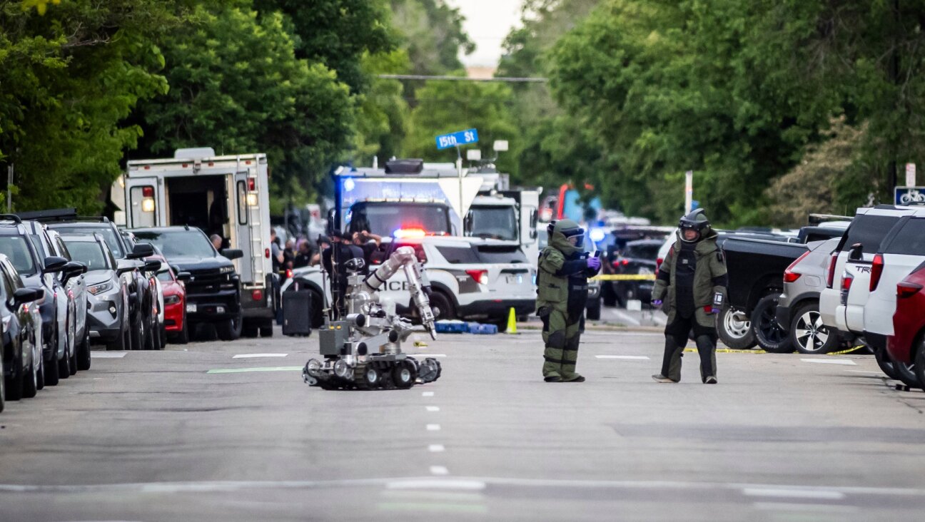 Bomb squads set up a staging area following an incident involving multiple injuries that the FBI is investigating as an act of terror on June 1, 2025 in Boulder, Colorado. A suspect is in custody after reportedly throwing an incendiary device at a group participating in an organized walk near the courthouse to show solidarity with hostages held by Hamas in Gaza. (Chet Strange/Getty Images)