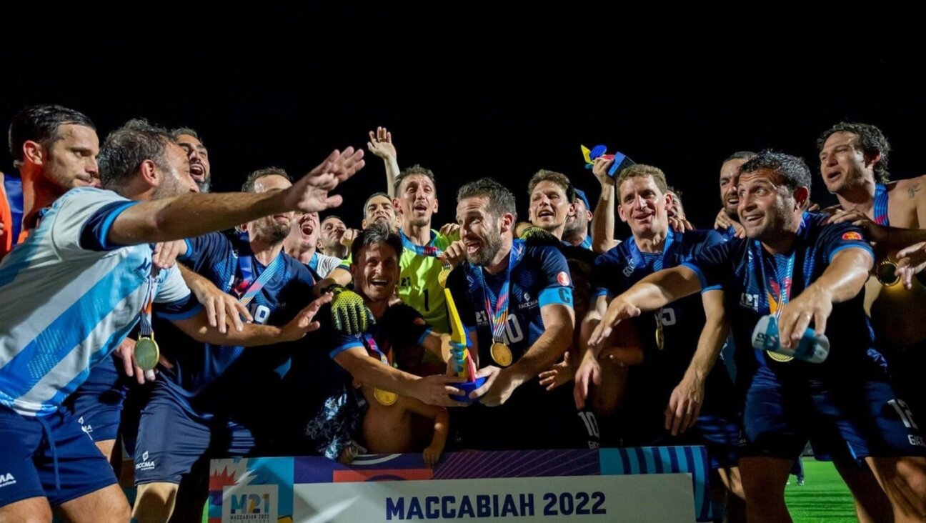 Argentina's 35-plus soccer squad celebrates winning gold at the Maccabiah Games in Israel. (Courtesy of FACCMA)