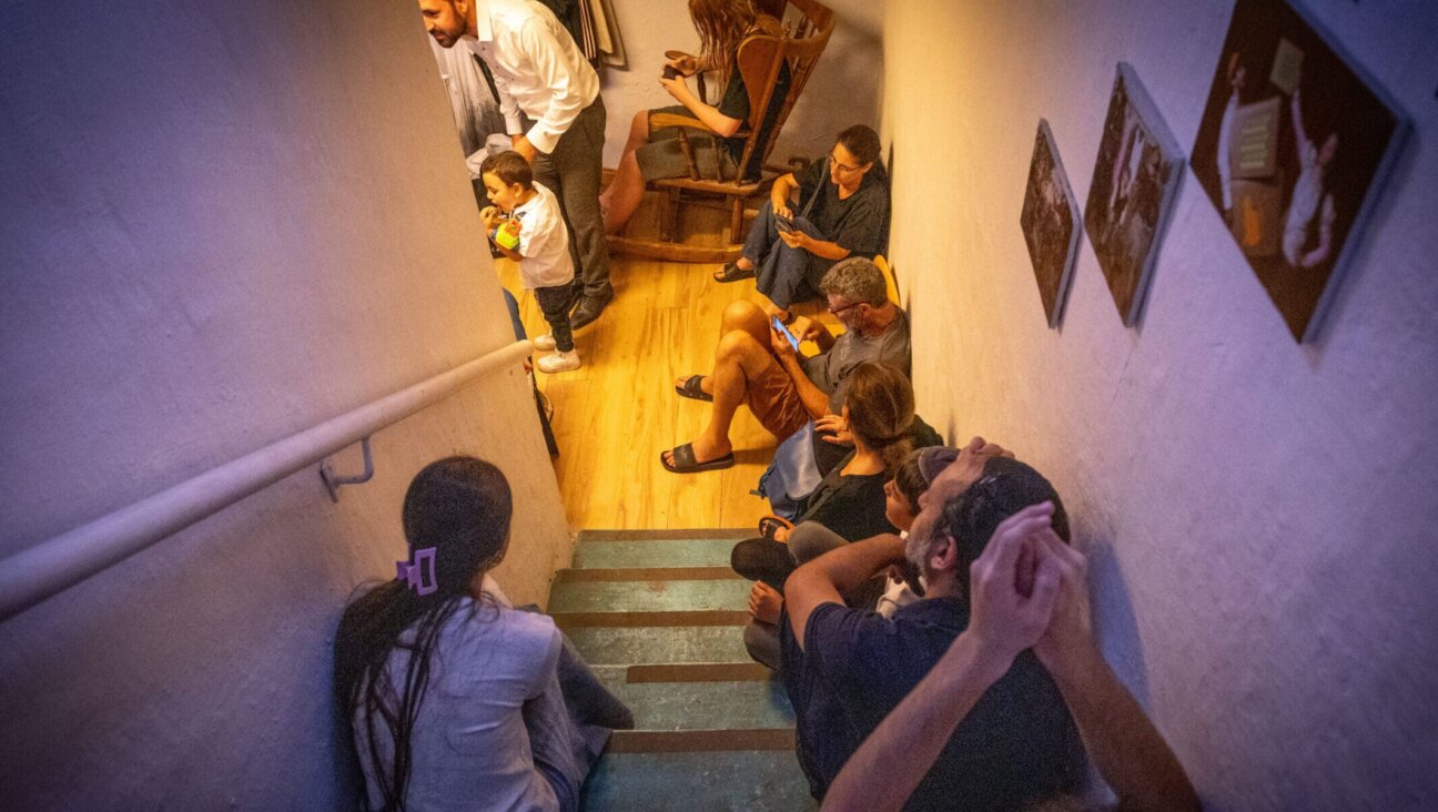 Israelis take cover in a public shelter in Jerusalem, during a ballistic missile attack fired from Iran into Israel June 13, 2025. (Noam Revkin Fenton/Flash 90)