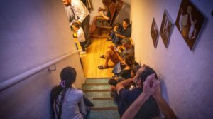 Israelis take cover in a public shelter in Jerusalem, during a ballistic missile attack fired from Iran into Israel June 13, 2025. (Noam Revkin Fenton/Flash 90)