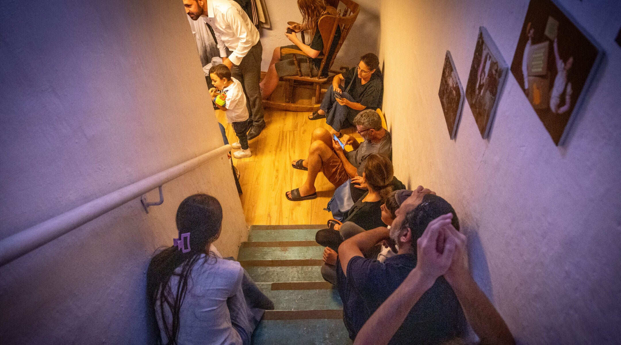 Israelis take cover in a public shelter in Jerusalem, during a ballistic missile attack fired from Iran into Israel June 13, 2025. (Noam Revkin Fenton/Flash 90)