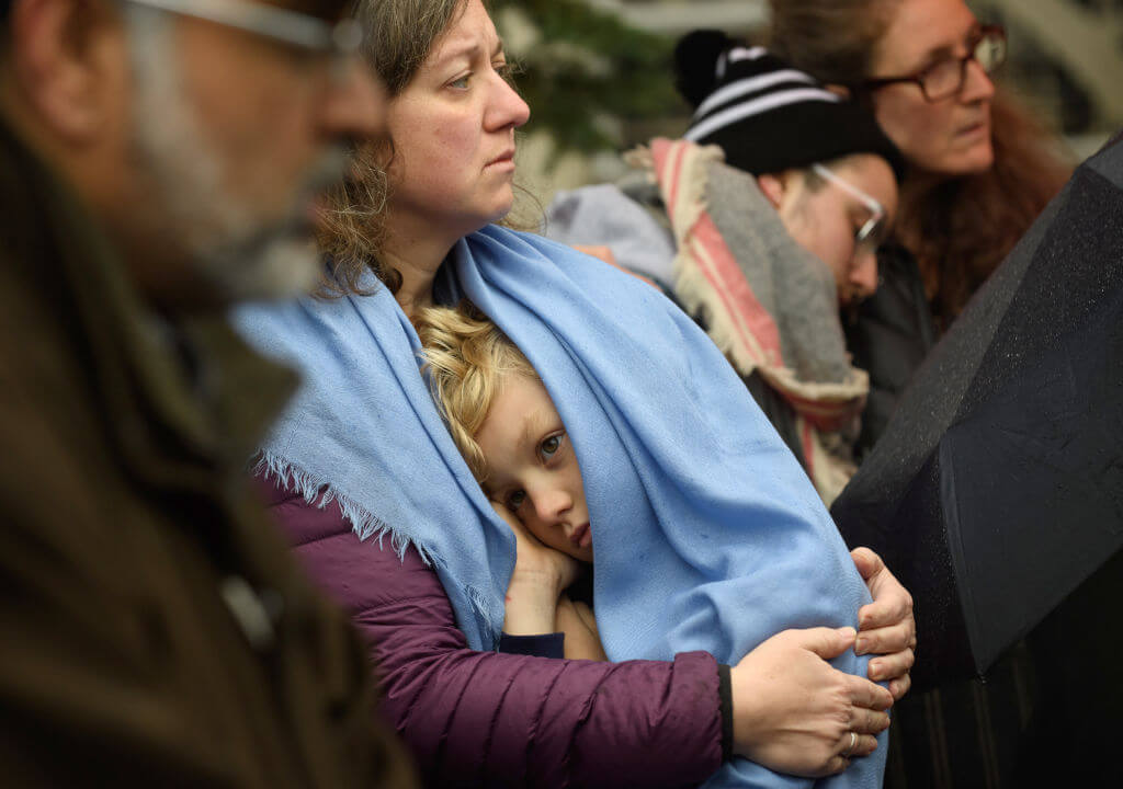 Worshippers listen to Rabbi Chuck Diamond, former Rabbi of the Tree of Life Congregation, as he conducts a Shabbat prayer vigil in front of the Tree of Life Synagogue on November 3, 2018 in Pittsburgh, Pennsylvania, after a mass shooting there on Oct. 27 killed 11 people.