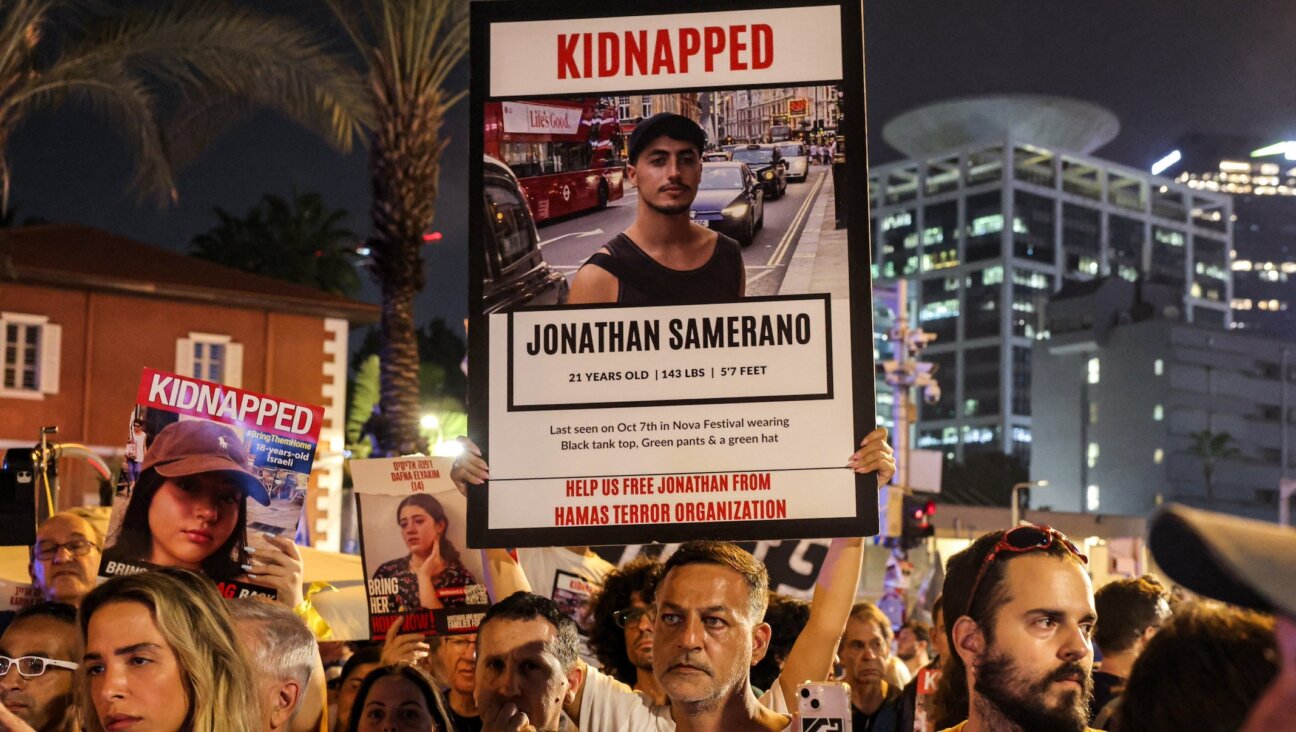 A poster of hostage Jonathan Samerano is seen at a demonstration calling for the release of Israeli hostages held by Palestinian terrorists after the Oct. 7 attack, near Azrieli Mall in Tel Aviv, Oct. 24, 2023. (Ahmad Gharabli/AFP via Getty Images)