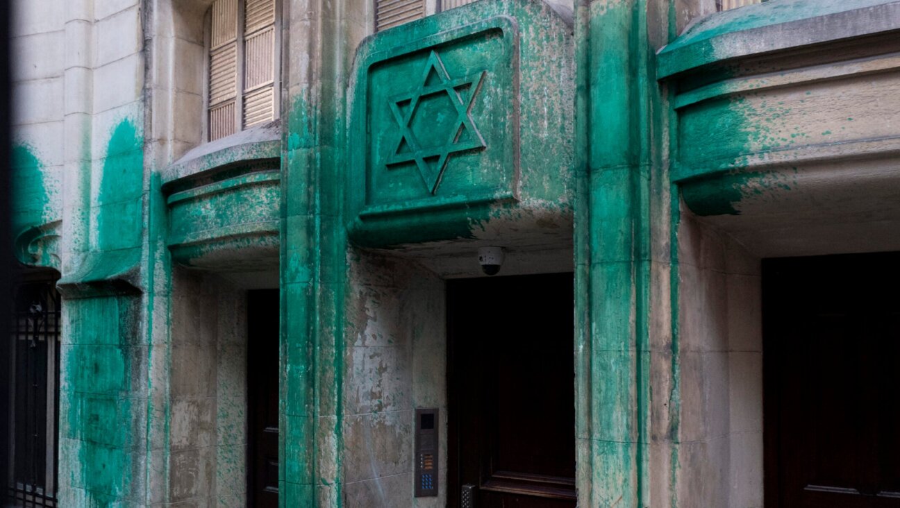A photo shows green paint thrown on the walls of the Agoudas Hakehilos synagogue in Paris on May 31, 2025. The Shoah Memorial, two synagogues, and a restaurant in central Paris were sprayed with green paint overnight on May 30, 2025, according to police sources. (Photo by Magali Cohen / Hans Lucas / Hans Lucas via AFP via Getty Images)
