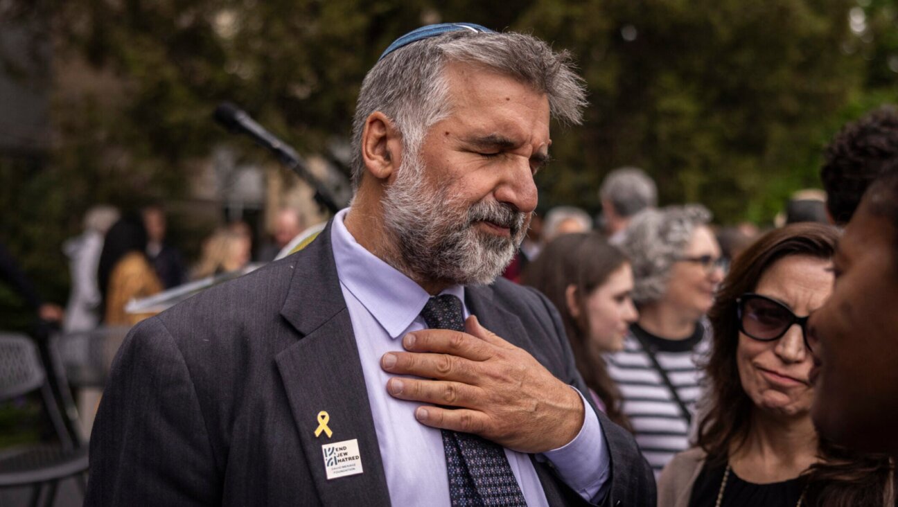 Congregation Bonai Shalom Rabbi Marc Soloway comforts attendees during a community gathering at the site of an attack against a group people holding a vigil for Israeli hostages in Gaza in Boulder, Colorado, June 4, 2025. (Chet Strange / AFP via Getty Images)