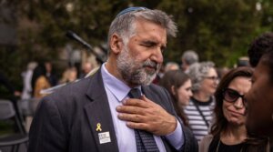 Congregation Bonai Shalom Rabbi Marc Soloway comforts attendees during a community gathering at the site of an attack against a group people holding a vigil for Israeli hostages in Gaza in Boulder, Colorado, June 4, 2025. (Chet Strange / AFP via Getty Images)