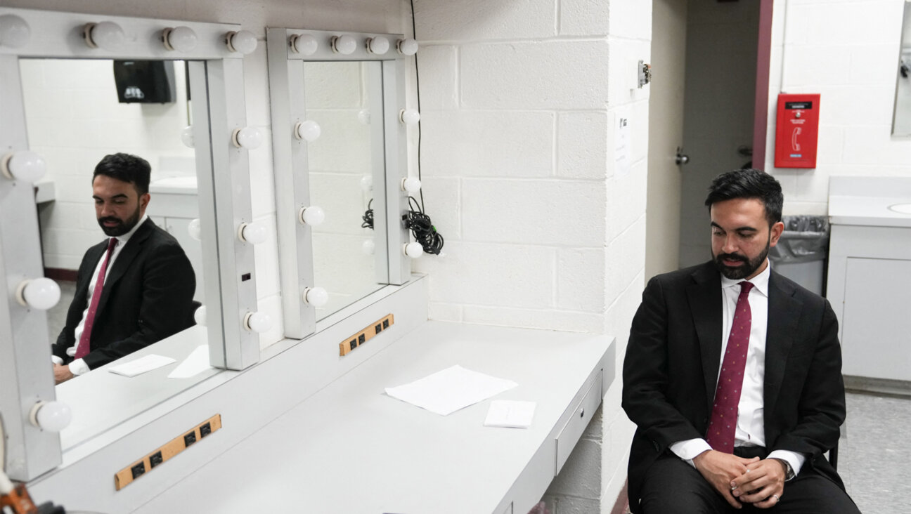 Assemblyman Zohran Mamdani prepares before the New York City Democratic Mayoral Primary Debate in June.