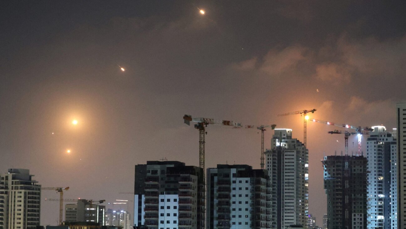 This picture shows rocket trails in the sky above Netanya, Israel, on June 13, 2025. (Jack Guez/AFP via Getty Images)