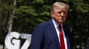 President Donald Trump speaks to reporters with the British prime minister (out of frame) during the Group of Seven (G7) Summit at the Pomeroy Kananaskis Mountain Lodge in Kananaskis, Alberta, Canada on June 16, 2025. 