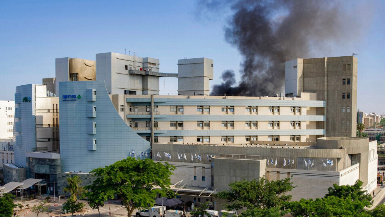 Smoke billows from a building at Soroka Hospital in Beersheba in southern Israel following an Iranian missile attack, on June 19, 2025. (Maya Levin/AFP via Getty Images)