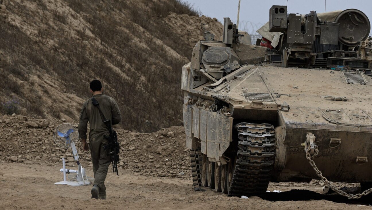 Israeli army tanks and military vehicles move in the areas near the border line of the Gaza Strip on June 23, 2025 in Israel. (Tsafrir Abayov/Anadolu via Getty Images)