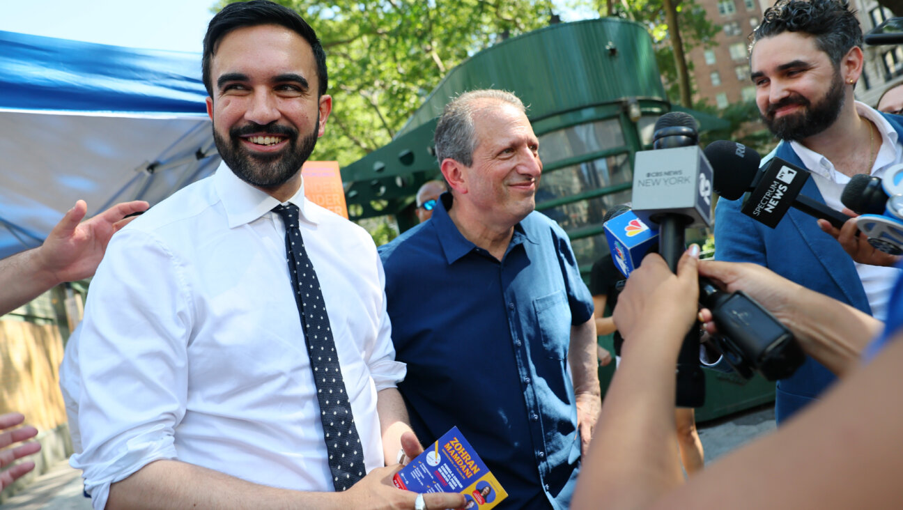 Zohran Mamdani walks with Brad Lander, the highest-ranking Jewish official in New York City who co-endorsed with Mamdani in the ranked choice primary.