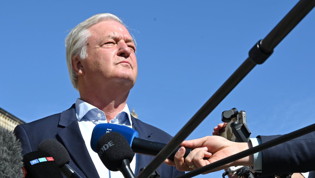 Jürgen Elsässer, editor-in-chief of the magazine “Compact”, is interviewed by journalists in front of the Federal Administrative Court in Leipzig. (Elisa Schu/picture alliance via Getty Images)