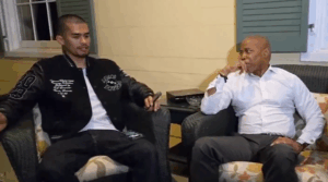 Antisemitic streamer Sneako and New York City Mayor Eric Adams smoke cigars at Gracie Mansion. (Screenshot)