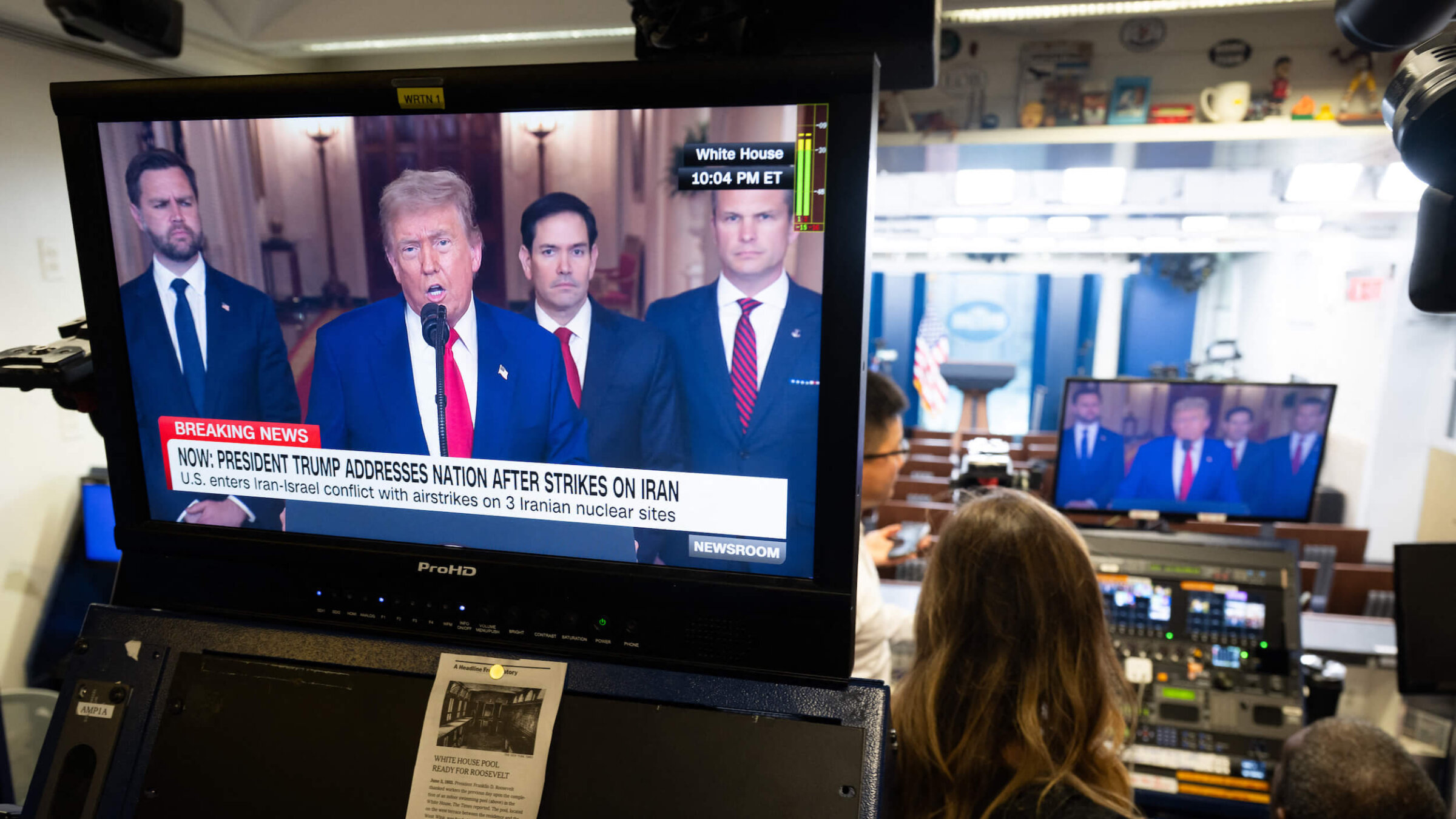 President Donald Trump addresses the nation regarding the US bombing of Iranian nuclear sites, as seen on a television screen in the Brady Press Briefing Room at the White House on June 21.