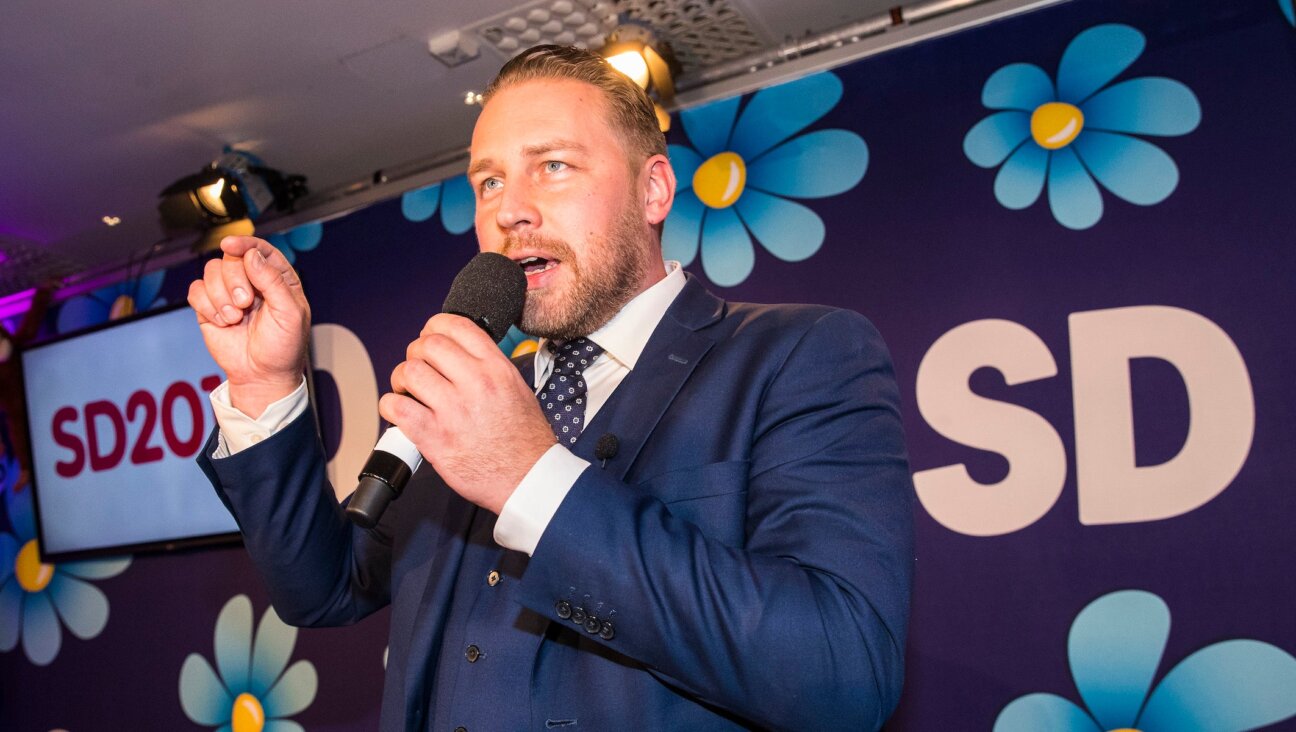 Mattias Karlsson speaks to members and supporters of the far-right Sweden Democrats at the party election center on September 9, 2018 in Stockholm, Sweden.