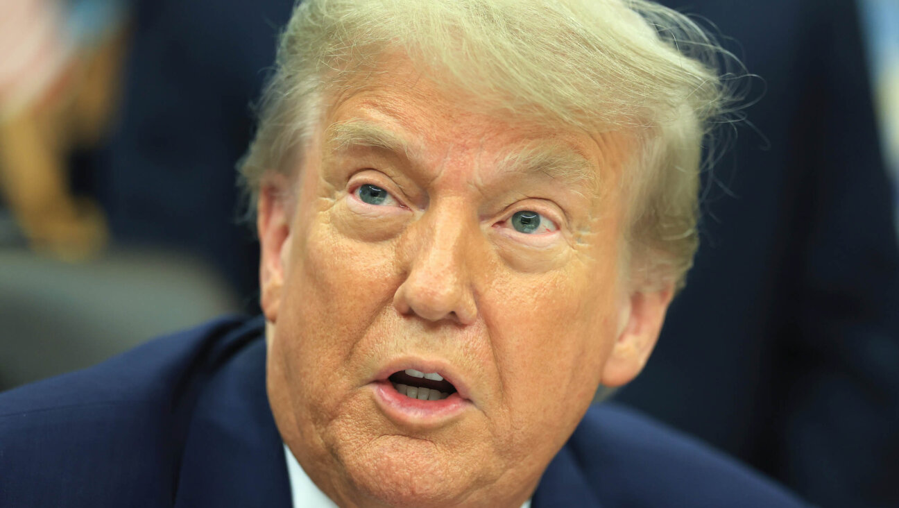 President Donald Trump delivers remarks in the Oval Office at the White House on June 27.