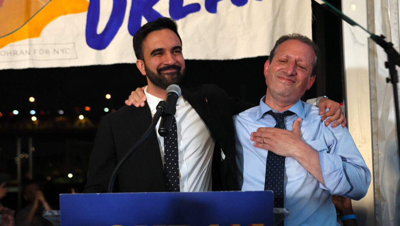 State Rep. Zohran Mamdani, winner of the New York City Democratic mayoral primary, is joined at his primary victory party by fellow candidate Brad Lander on June 24. 