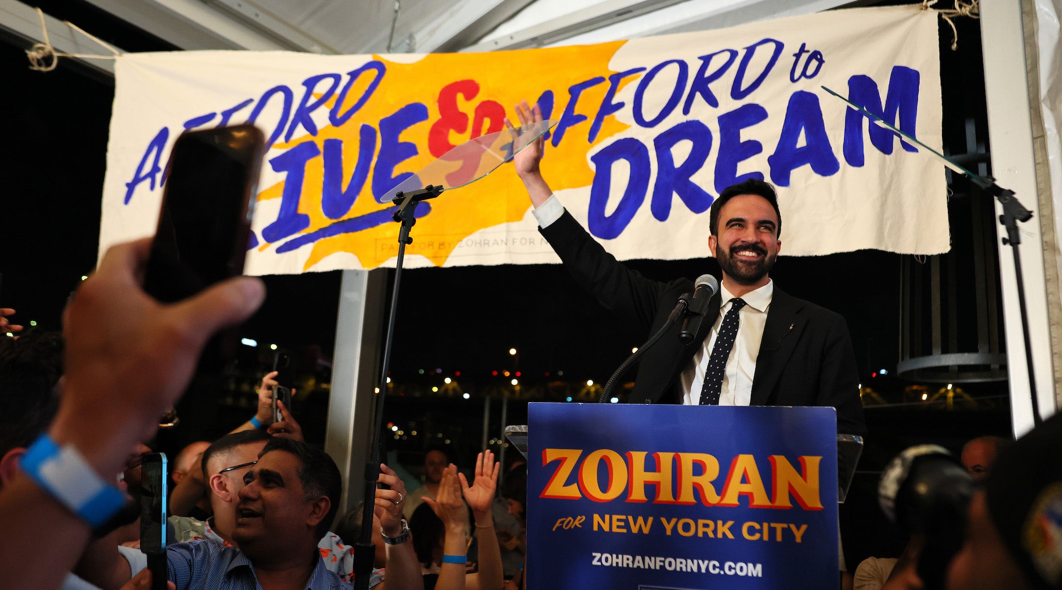 New York mayoral candidate Zohran Mamdani greets supporters during an election night gathering on June 24 in the Long Island City neighborhood of Queens in New York City. (Michael M. Santiago/Getty Images)